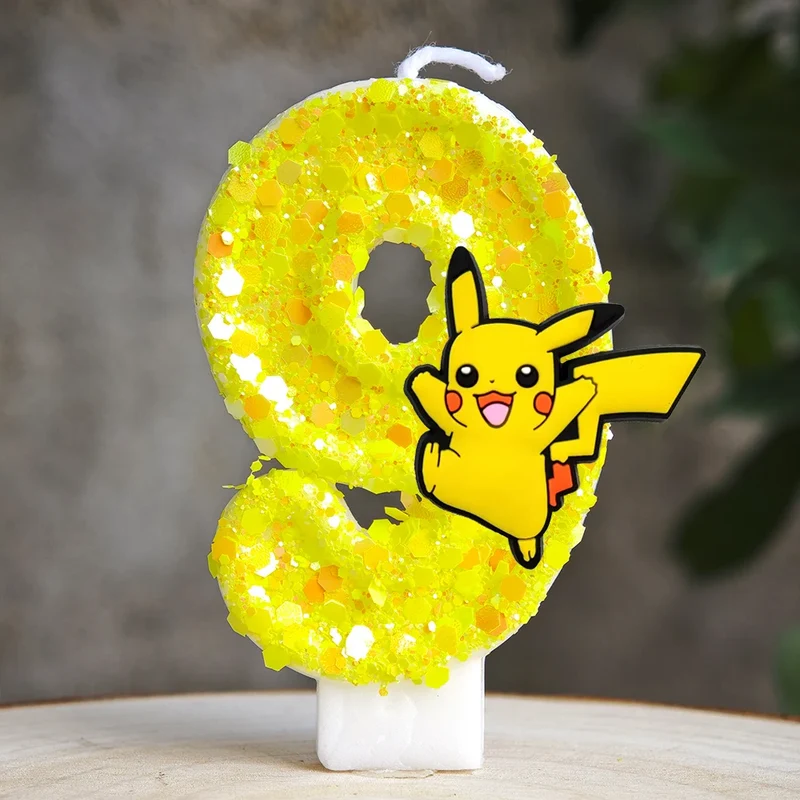Bougie d'anniversaire jaune Pikachu avec année