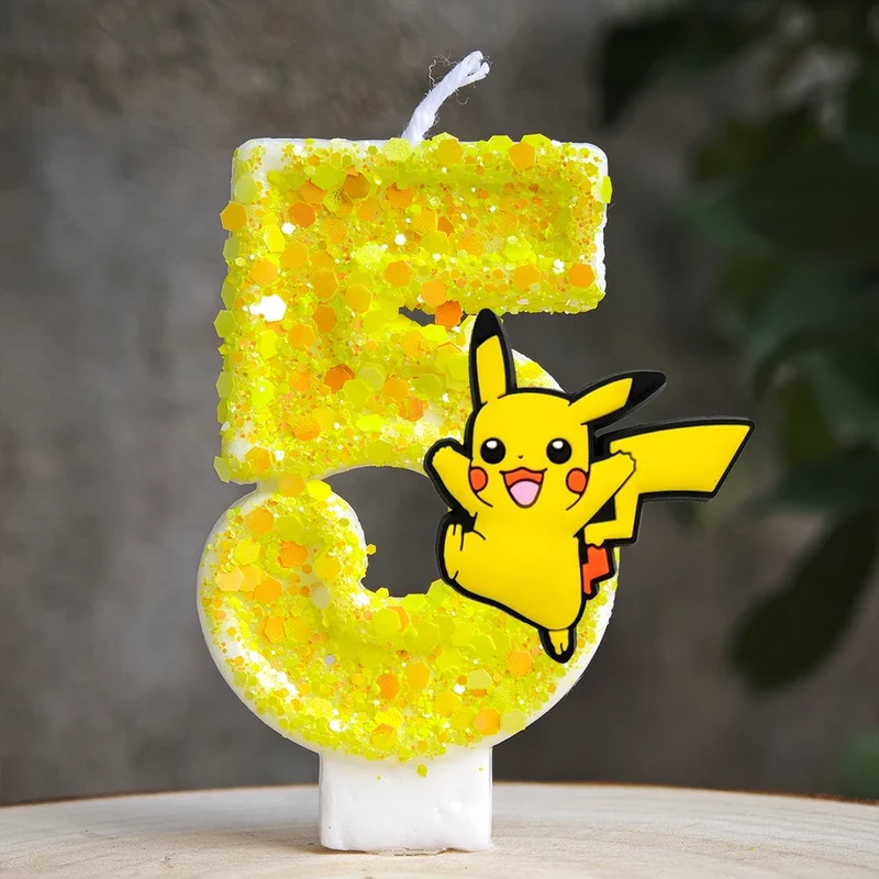 Bougie d'anniversaire jaune Pikachu avec année
