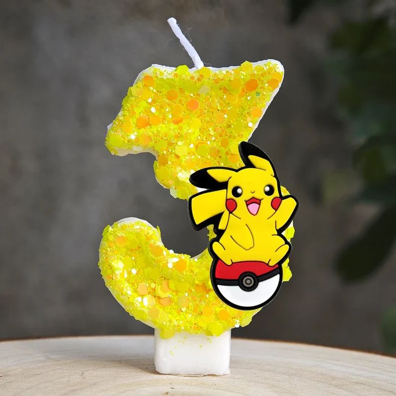 Bougie d'anniversaire jaune Pikachu avec année