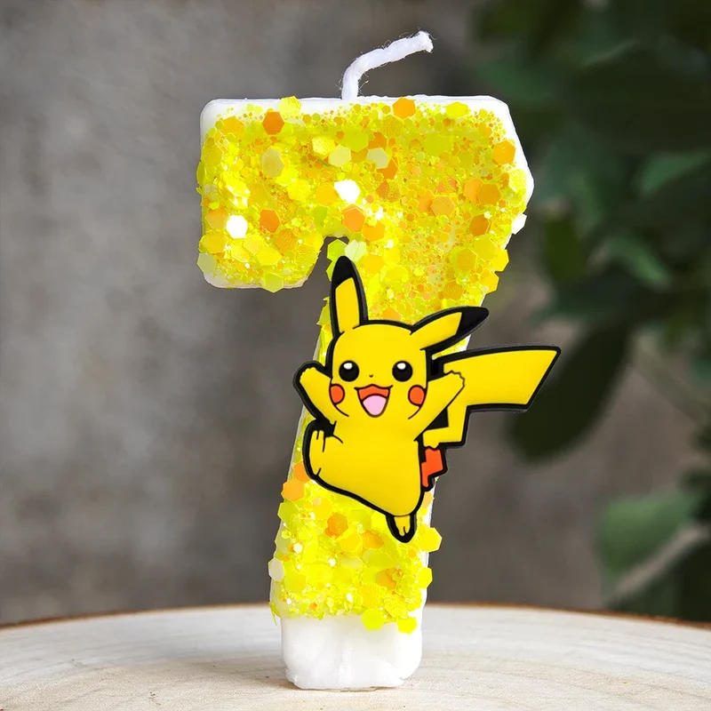 Bougie d'anniversaire jaune Pikachu avec année