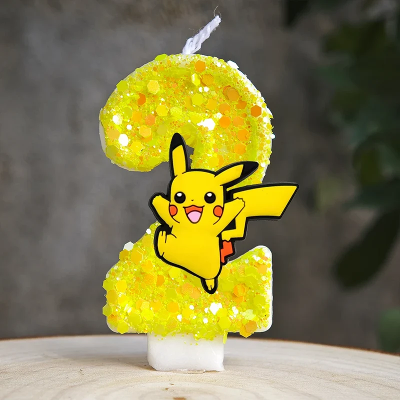 Bougie d'anniversaire jaune Pikachu avec année