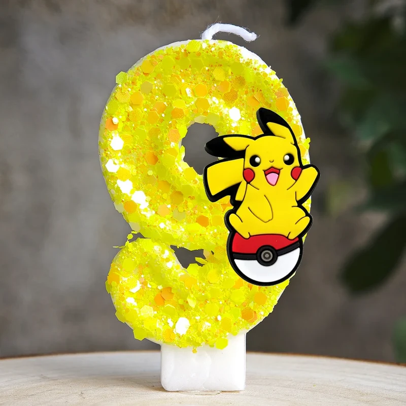 Bougie d'anniversaire jaune Pikachu avec année