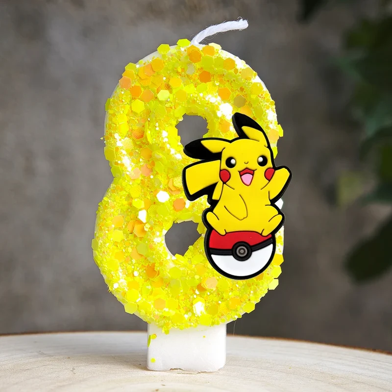 Bougie d'anniversaire jaune Pikachu avec année