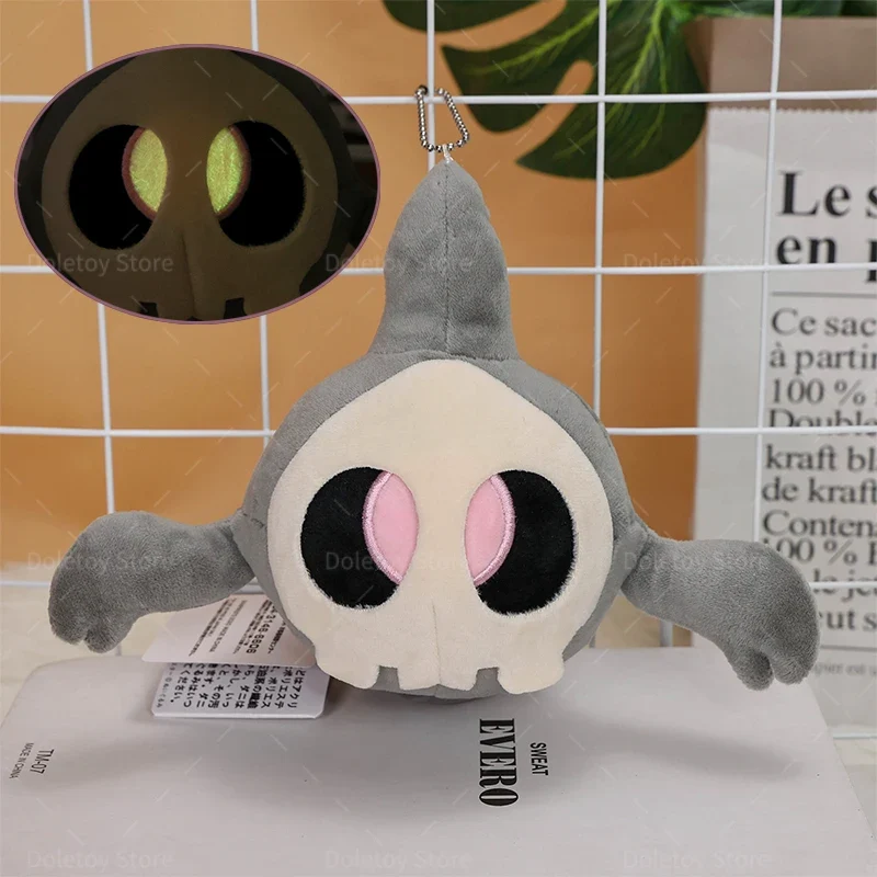 Pendentif en peluche Nebulak Gastly ou Zwirrlicht Duskull avec des yeux brillants dans le noir