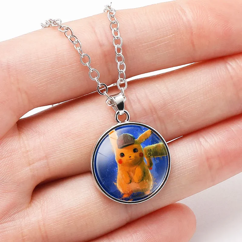 Collier ou bague avec pendentif Pokémon