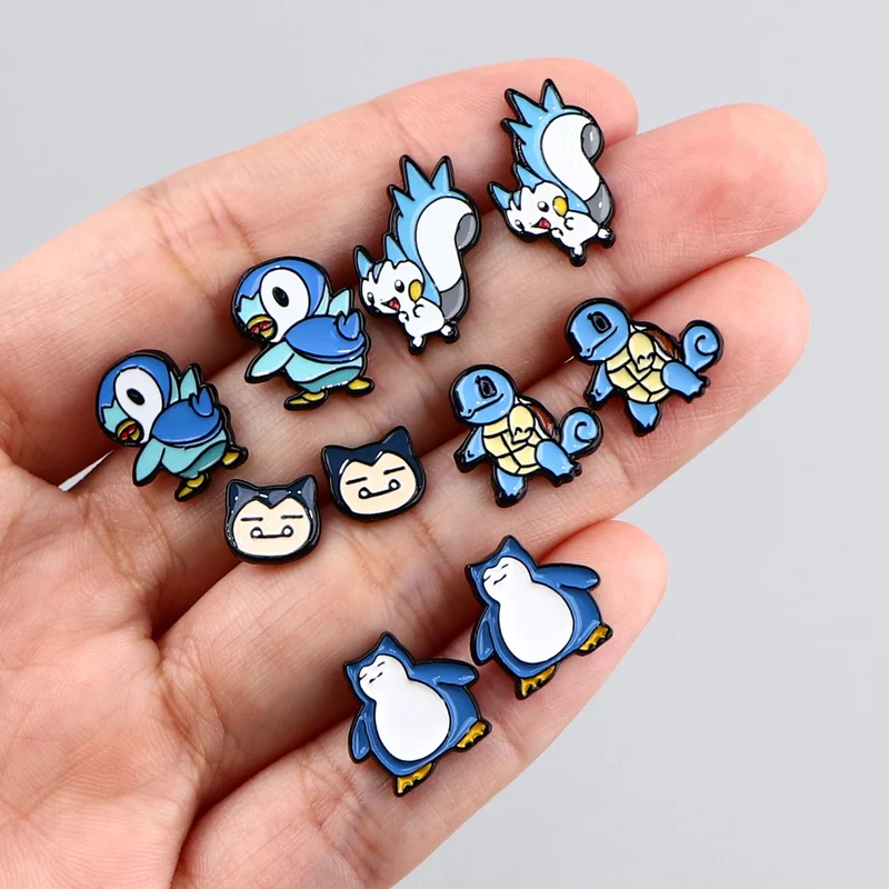 Boucles d'oreilles Pokémon avec de nombreux motifs différents.