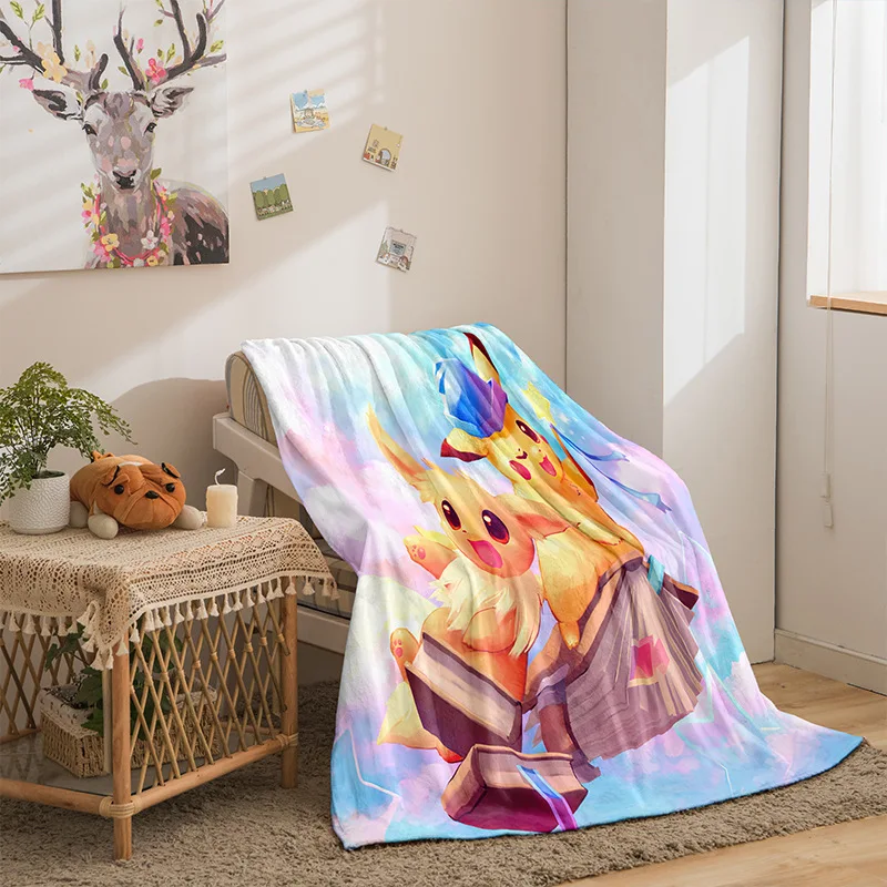 Couverture Pokémon avec de nombreux motifs (Pikachu, Évoli, etc.)