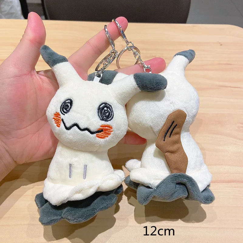 Peluche Pokémon Mimigma Mimikyu (env. 24cm, env. 38cm ou avec pendentif)