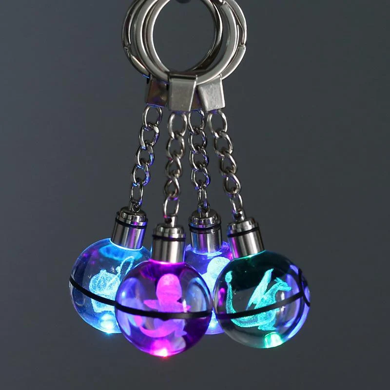 Pendentif Pokeball avec motifs Pokemon et changements de couleur