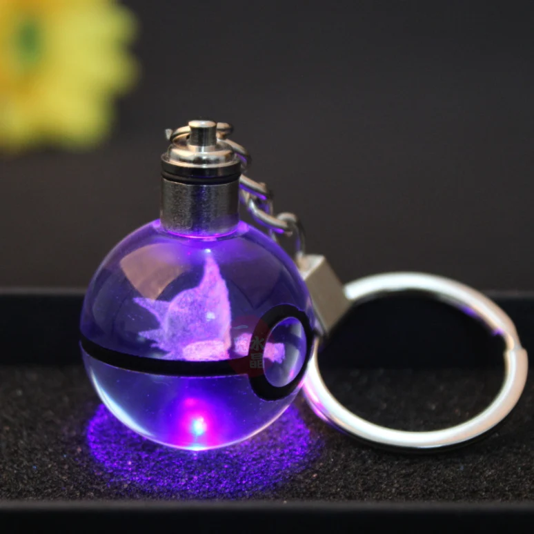 Pendentif Pokeball avec motifs Pokemon et changements de couleur