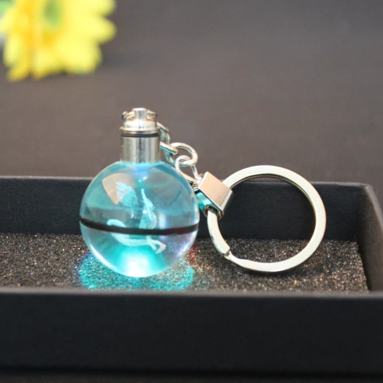Pendentif Pokeball avec motifs Pokemon et changements de couleur