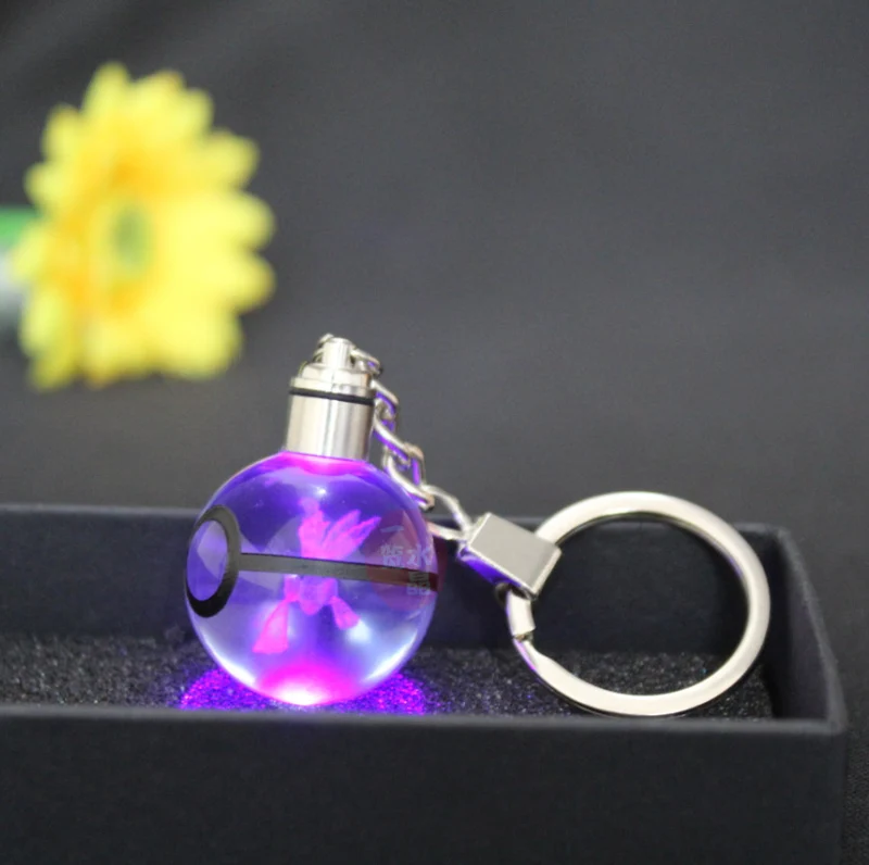 Pendentif Pokeball avec motifs Pokemon et changements de couleur