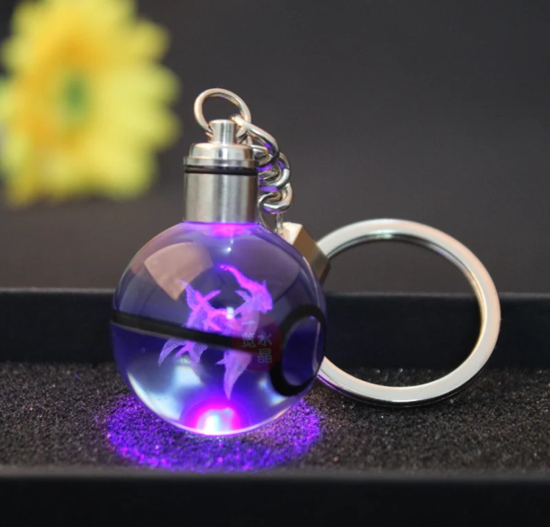 Pendentif Pokeball avec motifs Pokemon et changements de couleur