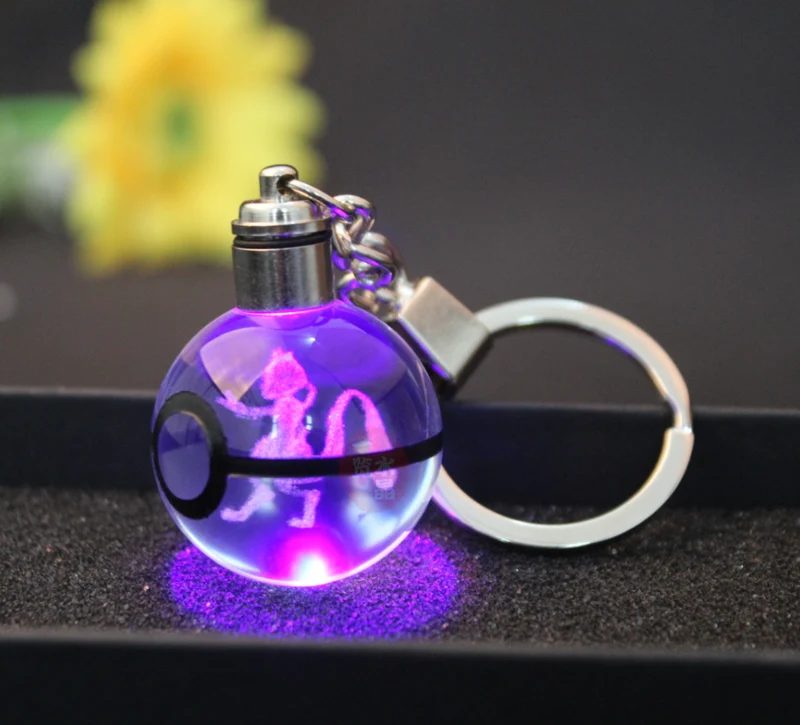 Pendentif Pokeball avec motifs Pokemon et changements de couleur