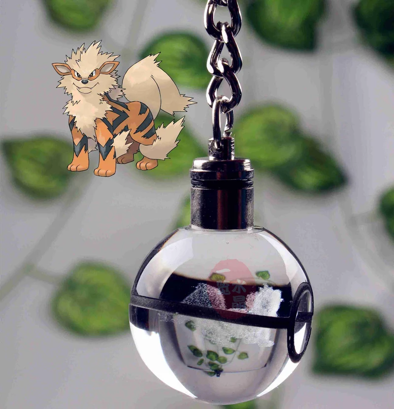 Pendentif Pokeball avec motifs Pokemon et changements de couleur